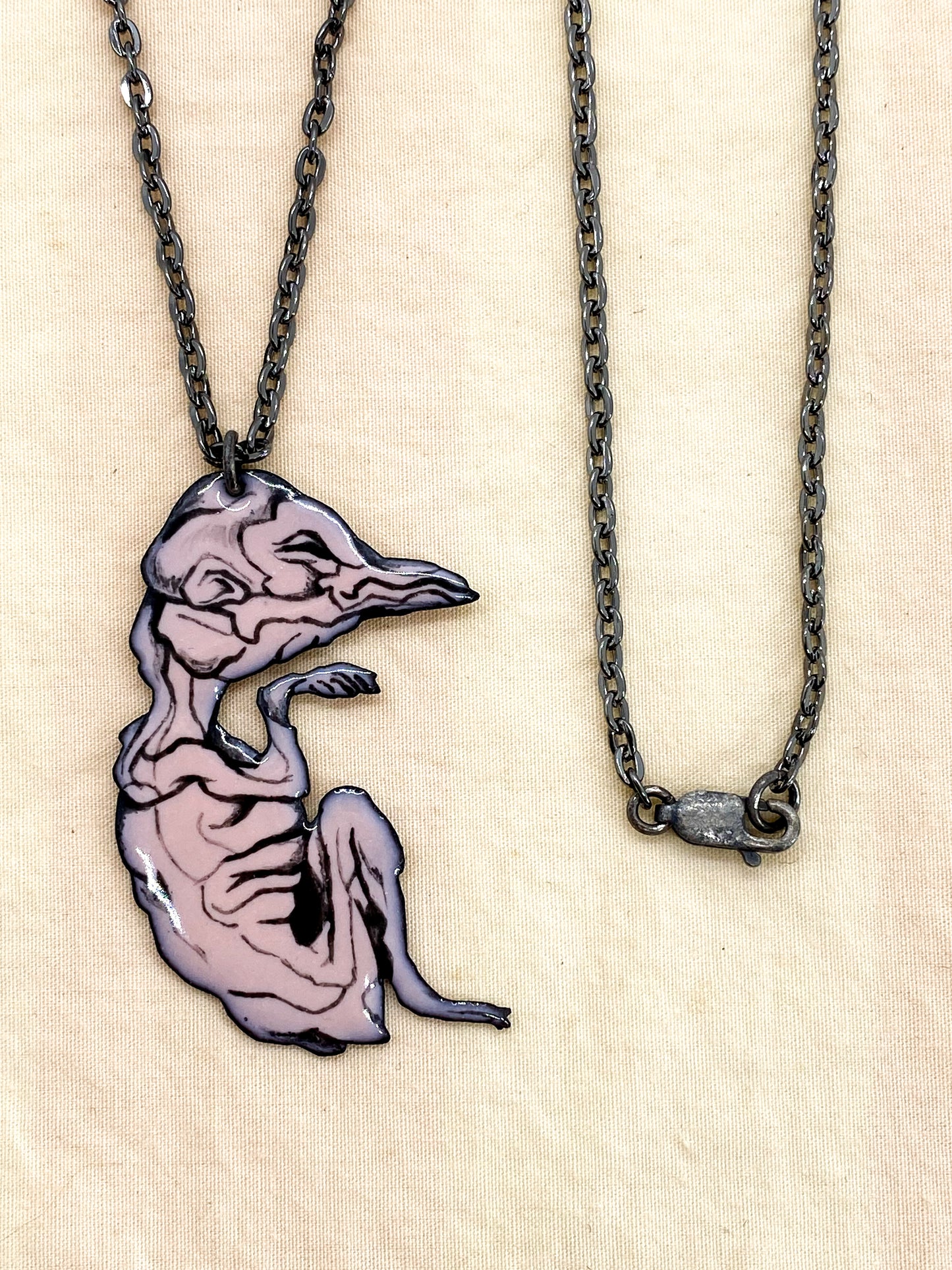 Fetal Position Baby Bird Necklace