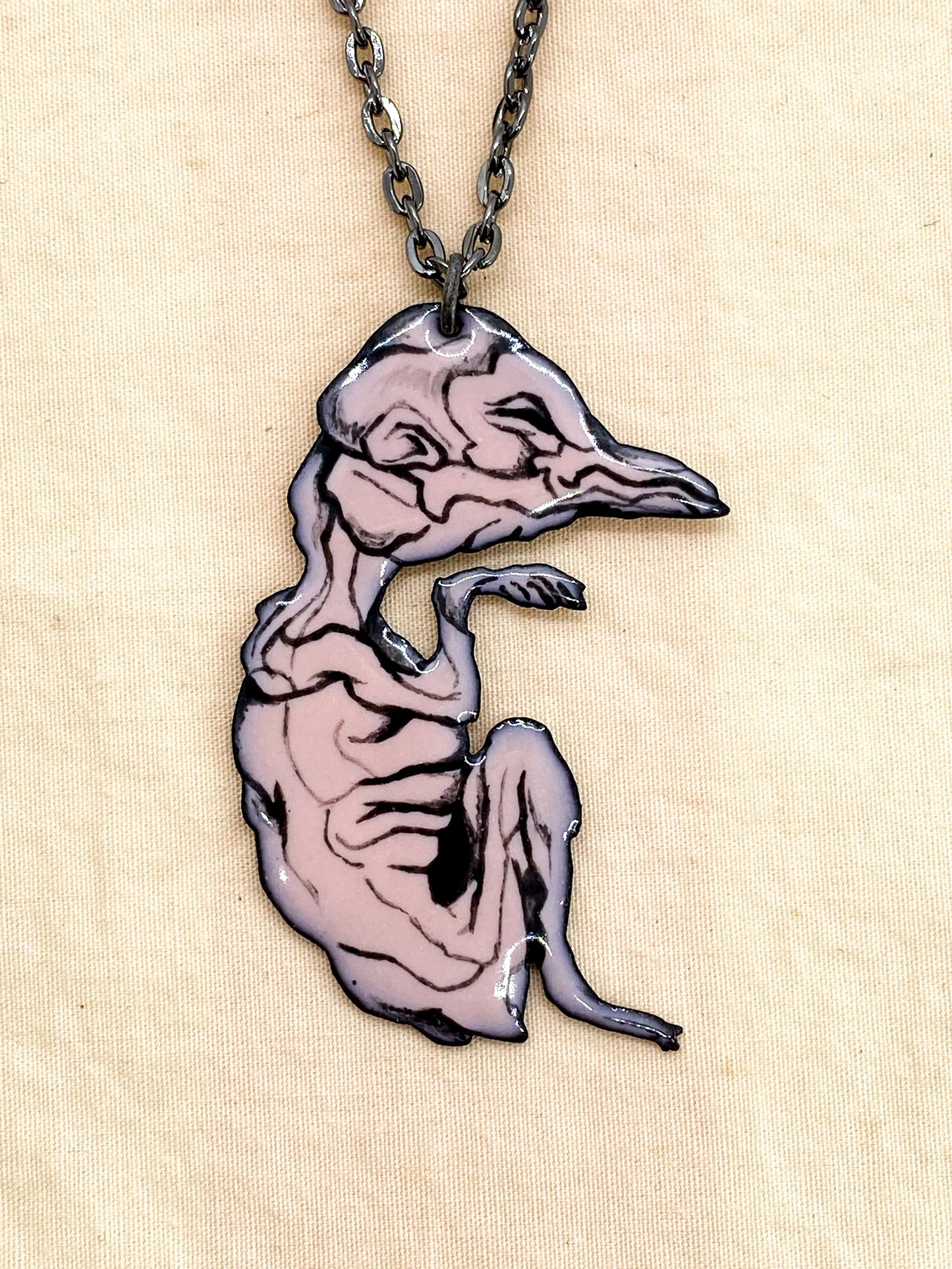 Fetal Position Baby Bird Necklace